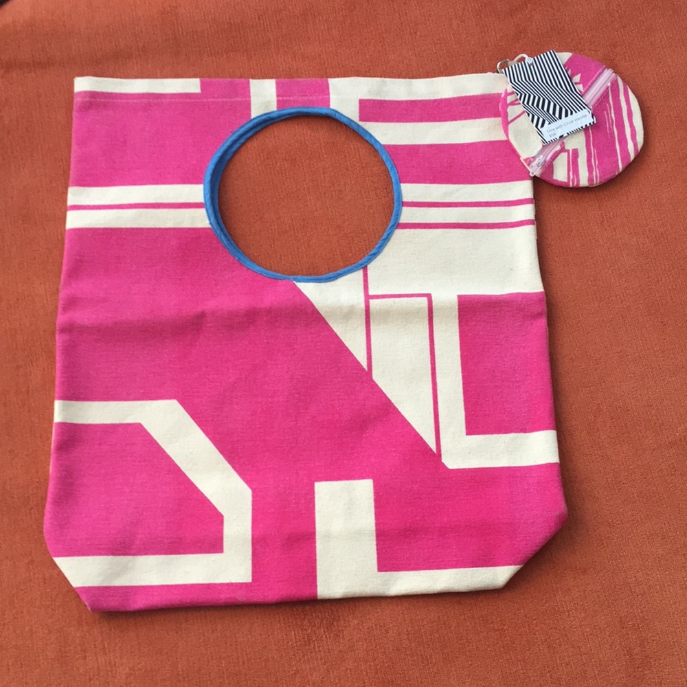 Custom made, multi color tote with circle handle.